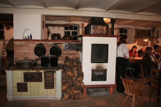 Holzofen, Kamin in die Stube