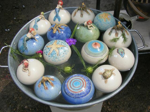 Schwimmkugeln mit Figuren
