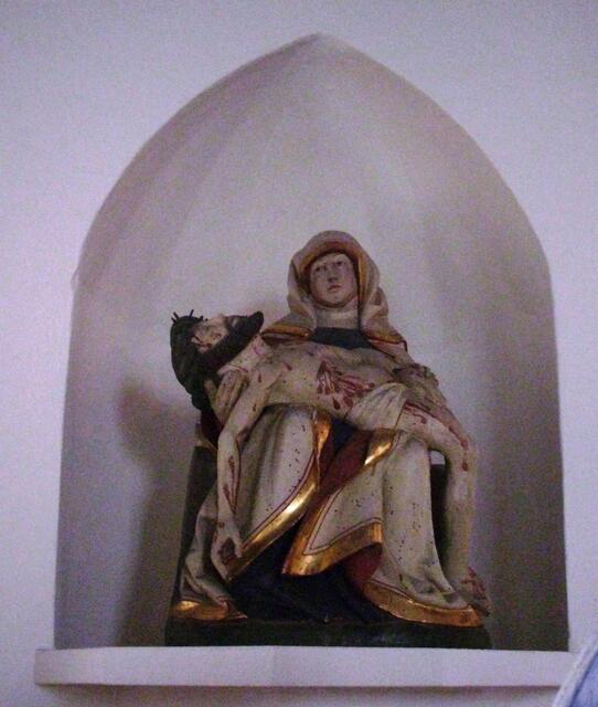 Pieta - Maria trägt den Korpus von Jesus in stiller Trauer