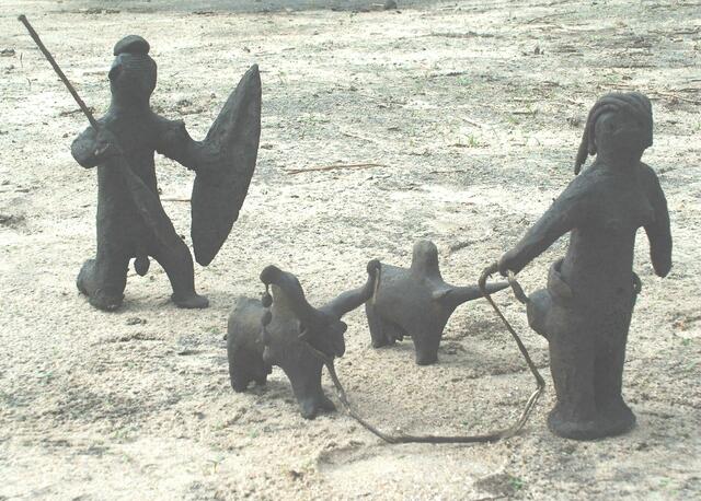 Frau mit Kühen, Mann mit Speer