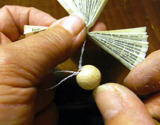 . .den doppelt liegende Faden durchziehen