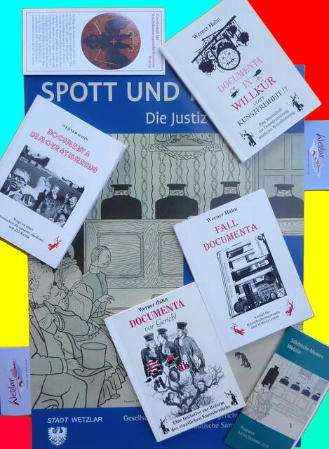USTIZ-art-Installation: Plakat Stadt Wetzlar, 4 documenta-Bücher mit KRITIK an (...). 26/1/11 (a&s-p.)