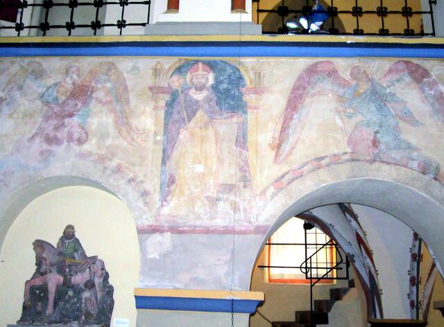 der hl. Martin ist der Patron der Kirche. Hier sehen wir ihn auf einer Wandmalerei aus dem 13. Jh.