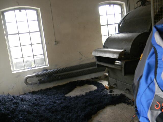 In dieser Maschine wurde die Wolle aufgelockert.