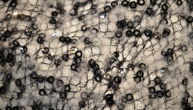 Mit winzigen Pailetten