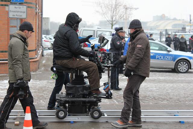 Kameramann samt Kameraschlitten