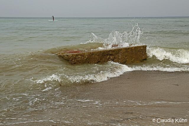 Ein Stein als Wellenbrecher