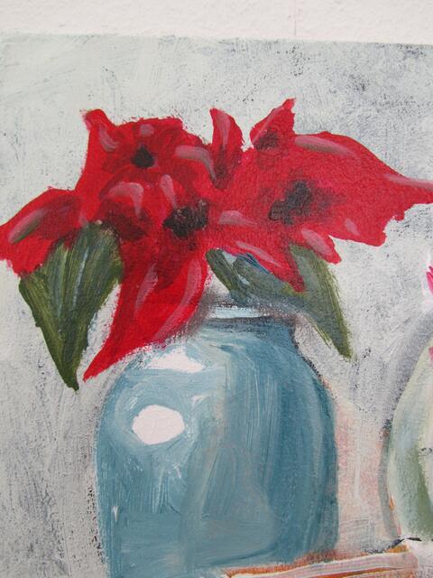 Weihnachtsstern in blauer Vase