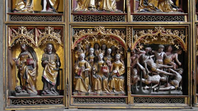 Detail des Allerheiligenaltars: Margarete und Laurentius; die heilige Ursula und andere Heilige; zehntausend Märtyrer, die durch den Sturz in die Dornen sterben
