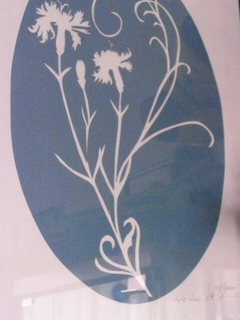 Scherenschnitt unter Glas