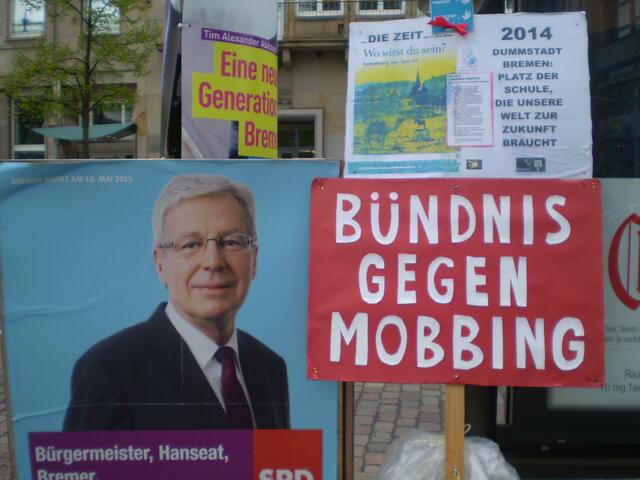 BAKI-Plakat zum 1. Mai 2015 auf dem Domshof in Bremen nach der DGB-Veranstaltung