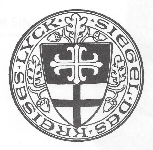 Siegel des Kreises Lyck (1933) > https://de.wikipedia.org/wiki/Kreis_Lyck | Foto: https://de.wikipedia.org/wiki/Kreis_Lyck#/media/File:Kreis_Lyck_(Siegel).jpg