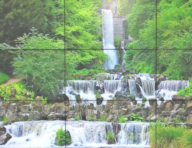 Bildwand im Besucherinformationszentrum am Herkules