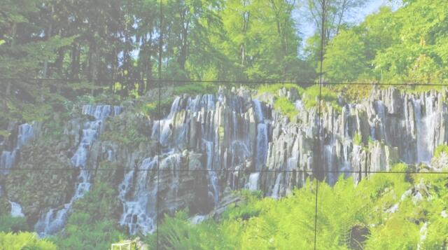 Bildwand im Besucherinformationszentrum am Herkules