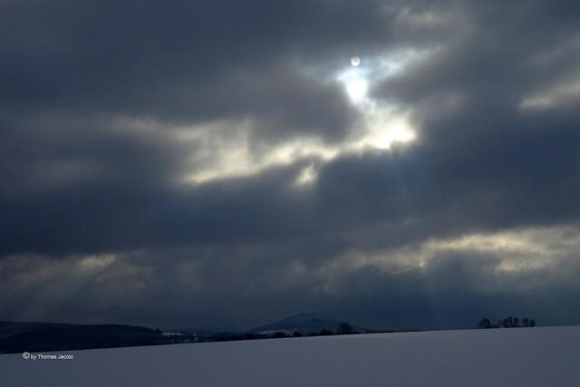 Wolken und Sonne über dem Bärenstein