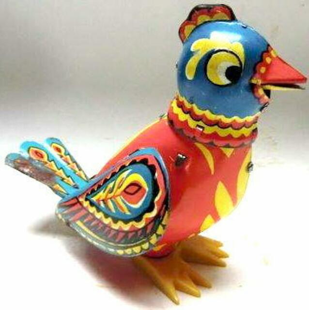 beweglicher Blechspatz mit Federwerk.