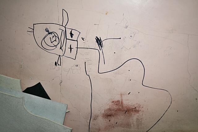 Kindliche Malerei an der Wand