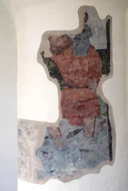 Das 1958 freigelegte Fragment der Säulenbemalung zeigt den heiligen Christophorus mit dem Jesuskind auf seiner Schulter.