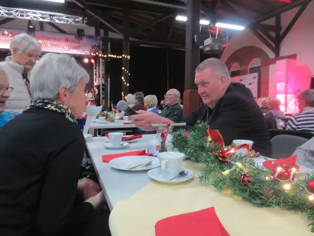 Jens Meier unterhält sich mit meinen Tischnachbarn.