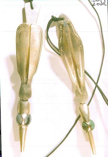 Moskitoplage - Silberne Kaffelöffel und Türkiskugeln